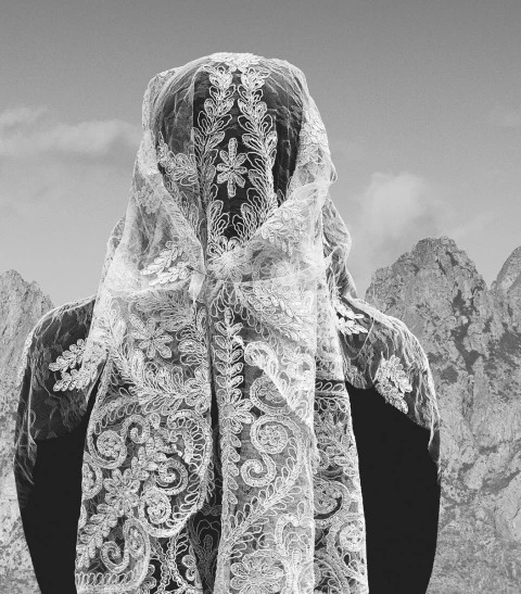 Veiled lament singer in the mountains, photographed by Ioanna Sakellaraki
